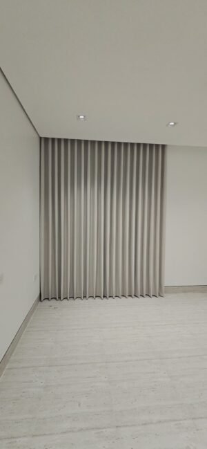 Grey Wave Curtain Installation - Full Wall Drape