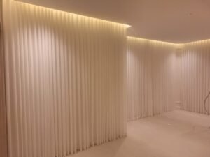 Cream Wave Curtains with Cove Ceiling Lighting