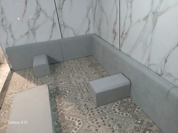 014-1.jpg Grey Majlis Floor Seating - Marble Wall Setting