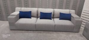 Light Grey Fabric Sofa with Blue Accent Cushions