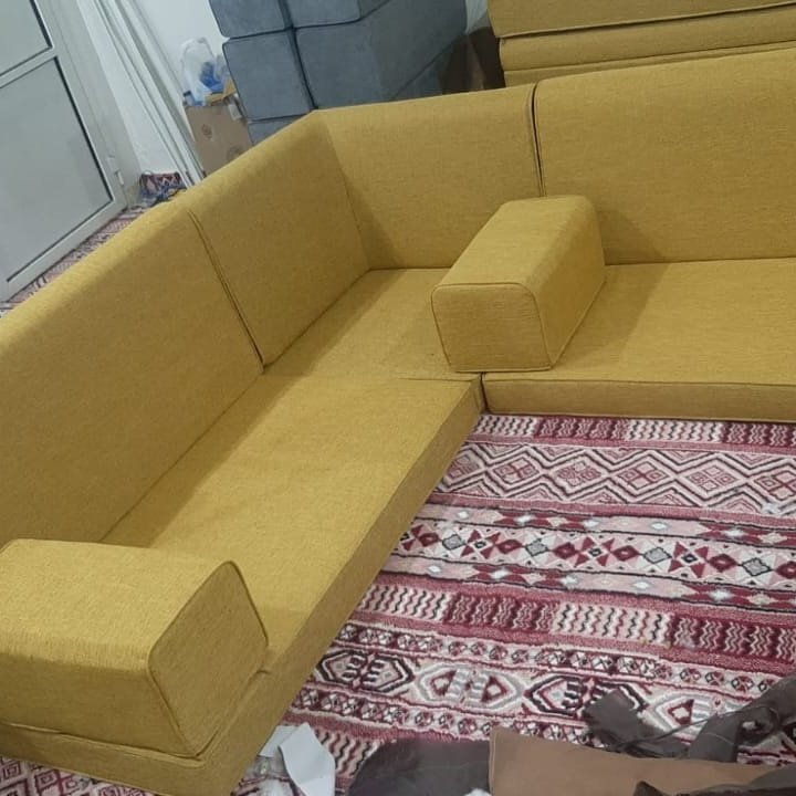 Mustard Yellow Corner Sofa with Patterned Rug